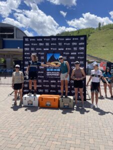 Mountain Games Athlete Haley Dumke on the podium at the 2024 Mountain Games.
